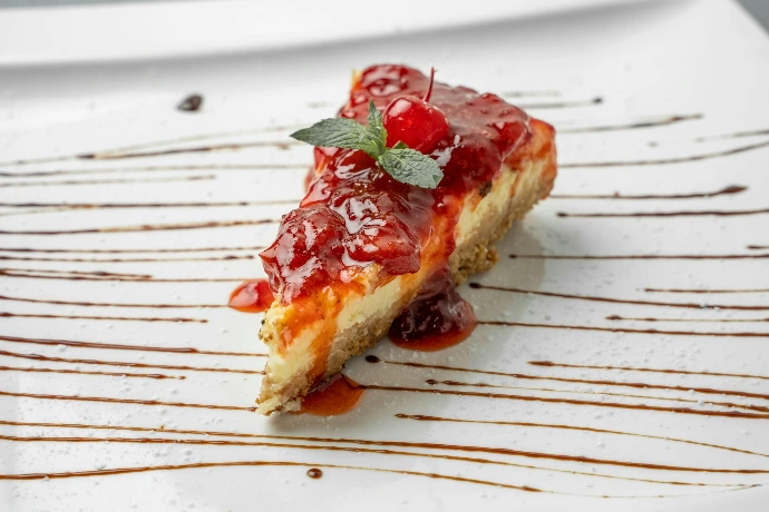 a piece of cheesecake on a white plate